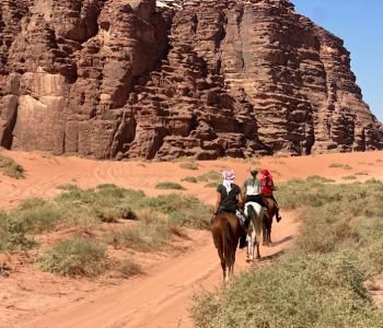 Riders on red dunes