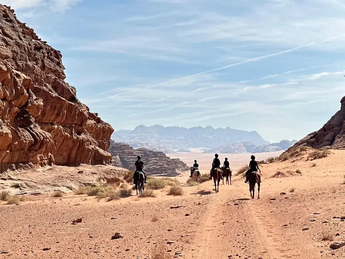 Bedouin horse riding through Wadi Rum